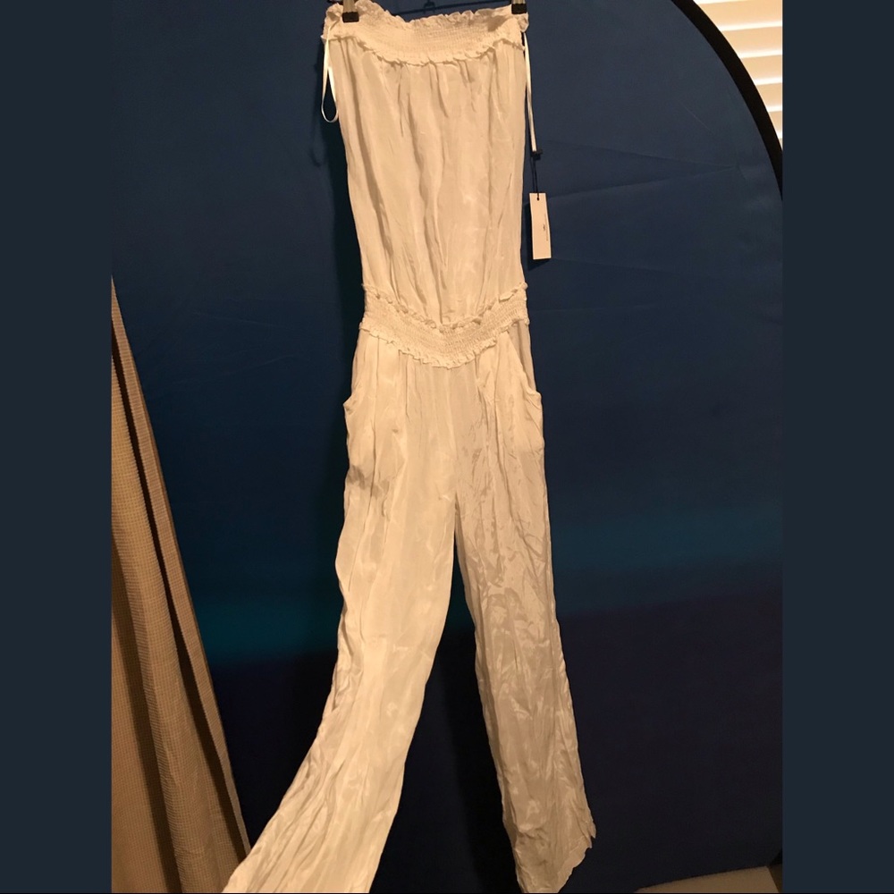 LAST CHANCE donating Monday gorgeous cover up romper new with tags. Size M